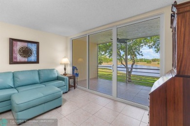 Enjoy a Serene Lake View from this Super Clean, Bright 2nd Floor on Palm-Aire Country Club and Resort - Palms in Florida - for sale on GolfHomes.com, golf home, golf lot