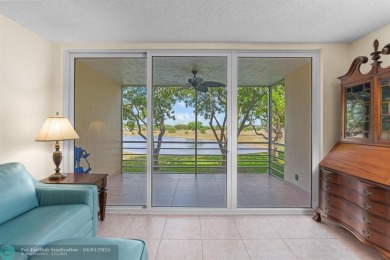 Enjoy a Serene Lake View from this Super Clean, Bright 2nd Floor on Palm-Aire Country Club and Resort - Palms in Florida - for sale on GolfHomes.com, golf home, golf lot