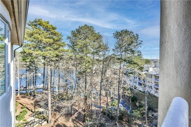 The Keowee Life Awaits You! This furnished third-floor Tall Ship on Keowee Key Golf and Country Club in South Carolina - for sale on GolfHomes.com, golf home, golf lot