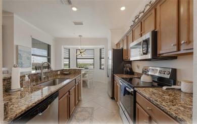 Discover this stunning top floor Bellini 2 BR + Den condo on Bonita National Golf Course in Florida - for sale on GolfHomes.com, golf home, golf lot