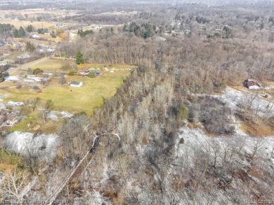 Over 3 acres of residential vacant land to build your dream on Hickory Creek Golf Course in Michigan - for sale on GolfHomes.com, golf home, golf lot