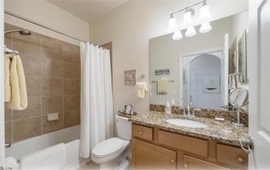 Discover this stunning top floor Bellini 2 BR + Den condo on Bonita National Golf Course in Florida - for sale on GolfHomes.com, golf home, golf lot