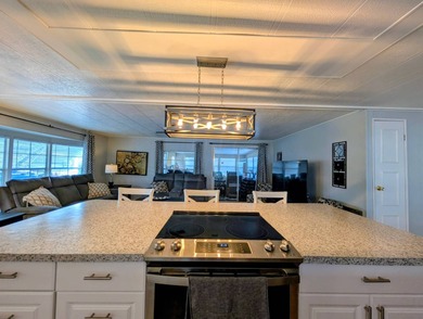 This immaculate home exudes charm and elegance, perfectly on Grasslands Golf and Country Club in Florida - for sale on GolfHomes.com, golf home, golf lot