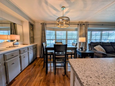 This immaculate home exudes charm and elegance, perfectly on Grasslands Golf and Country Club in Florida - for sale on GolfHomes.com, golf home, golf lot