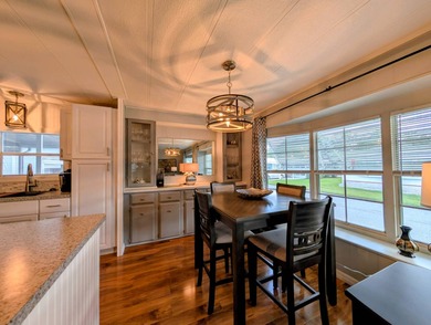 This immaculate home exudes charm and elegance, perfectly on Grasslands Golf and Country Club in Florida - for sale on GolfHomes.com, golf home, golf lot
