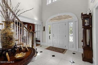 This beautiful brick home in River Landing seamlessly blends on River Landing Golf Course in North Carolina - for sale on GolfHomes.com, golf home, golf lot