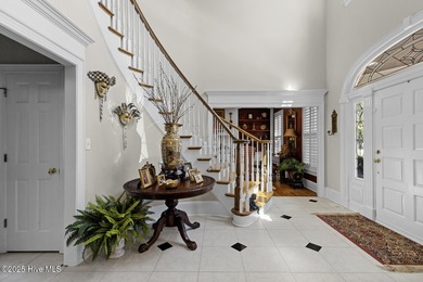 This beautiful brick home in River Landing seamlessly blends on River Landing Golf Course in North Carolina - for sale on GolfHomes.com, golf home, golf lot