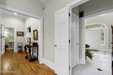 This beautiful brick home in River Landing seamlessly blends on River Landing Golf Course in North Carolina - for sale on GolfHomes.com, golf home, golf lot