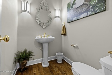 This beautiful brick home in River Landing seamlessly blends on River Landing Golf Course in North Carolina - for sale on GolfHomes.com, golf home, golf lot