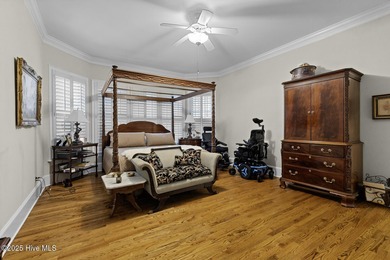 This beautiful brick home in River Landing seamlessly blends on River Landing Golf Course in North Carolina - for sale on GolfHomes.com, golf home, golf lot