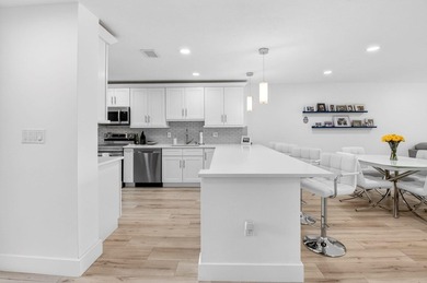 Experience refined comfort & effortless elegance in this on Hunters Run Golf and Country Club in Florida - for sale on GolfHomes.com, golf home, golf lot