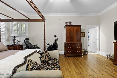 This beautiful brick home in River Landing seamlessly blends on River Landing Golf Course in North Carolina - for sale on GolfHomes.com, golf home, golf lot