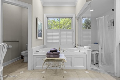 This beautiful brick home in River Landing seamlessly blends on River Landing Golf Course in North Carolina - for sale on GolfHomes.com, golf home, golf lot