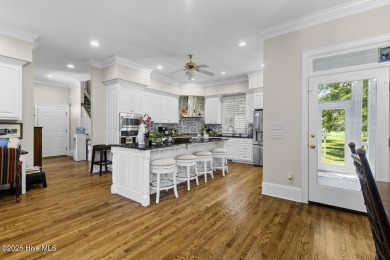 This beautiful brick home in River Landing seamlessly blends on River Landing Golf Course in North Carolina - for sale on GolfHomes.com, golf home, golf lot