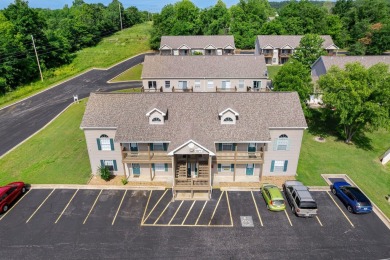 Fantastic fully furnished condo just steps from Lake Taneycomo! on Pointe Royale Village Country Club in Missouri - for sale on GolfHomes.com, golf home, golf lot