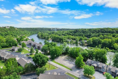 Fantastic fully furnished condo just steps from Lake Taneycomo! on Pointe Royale Village Country Club in Missouri - for sale on GolfHomes.com, golf home, golf lot