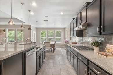 A true masterpiece! This exquisite home is a haven, boasting on Frisco Lakes Golf Course in Texas - for sale on GolfHomes.com, golf home, golf lot