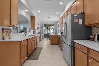 NEED EXTRA STORAGE-PROBLEM SOLVED in this Immaculate *CRESTVIEW* on Summerglen Country Club in Florida - for sale on GolfHomes.com, golf home, golf lot