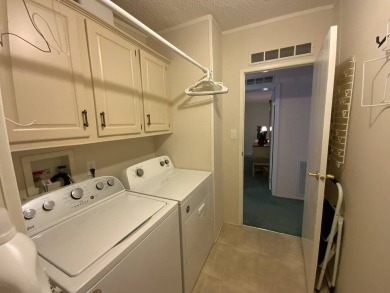 This well cared for home is furnished and includes the golf cart on Lake Fairways Country Club in Florida - for sale on GolfHomes.com, golf home, golf lot