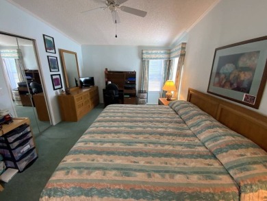 This well cared for home is furnished and includes the golf cart on Lake Fairways Country Club in Florida - for sale on GolfHomes.com, golf home, golf lot