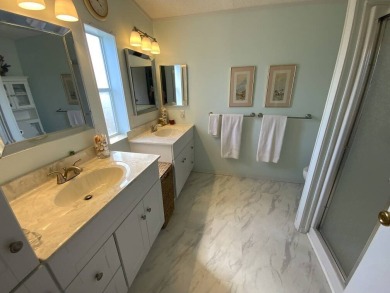 This well cared for home is furnished and includes the golf cart on Lake Fairways Country Club in Florida - for sale on GolfHomes.com, golf home, golf lot