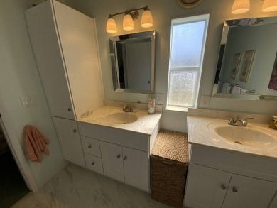 This well cared for home is furnished and includes the golf cart on Lake Fairways Country Club in Florida - for sale on GolfHomes.com, golf home, golf lot