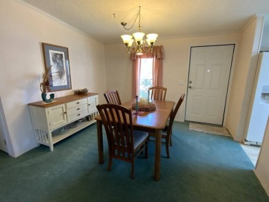 This well cared for home is furnished and includes the golf cart on Lake Fairways Country Club in Florida - for sale on GolfHomes.com, golf home, golf lot