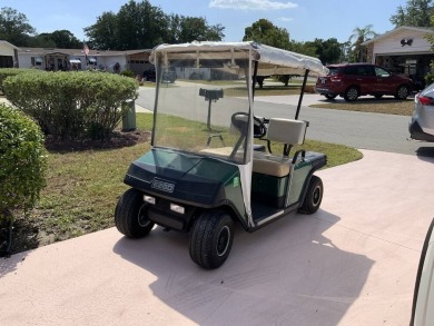 This well cared for home is furnished and includes the golf cart on Lake Fairways Country Club in Florida - for sale on GolfHomes.com, golf home, golf lot