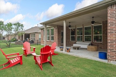 A true masterpiece! This exquisite home is a haven, boasting on Frisco Lakes Golf Course in Texas - for sale on GolfHomes.com, golf home, golf lot