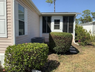 This well cared for home is furnished and includes the golf cart on Lake Fairways Country Club in Florida - for sale on GolfHomes.com, golf home, golf lot