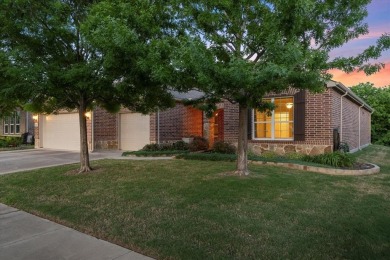 A true masterpiece! This exquisite home is a haven, boasting on Frisco Lakes Golf Course in Texas - for sale on GolfHomes.com, golf home, golf lot