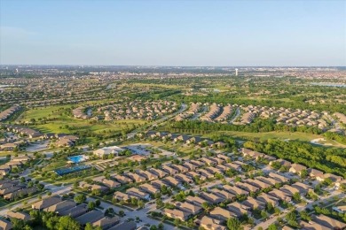 A true masterpiece! This exquisite home is a haven, boasting on Frisco Lakes Golf Course in Texas - for sale on GolfHomes.com, golf home, golf lot