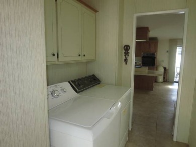 Very spacious home with natural light flowing in from all sides on Whisperwood Golf Course in Florida - for sale on GolfHomes.com, golf home, golf lot