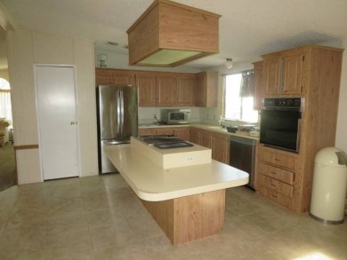 Very spacious home with natural light flowing in from all sides on Whisperwood Golf Course in Florida - for sale on GolfHomes.com, golf home, golf lot