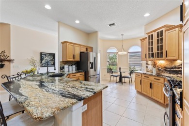 WOW! WELCOME HOME to this BEAUTIFUL DESIGNER GARDENIA! CENTRALLY on Glenview Championship Golf and Country Club in Florida - for sale on GolfHomes.com, golf home, golf lot