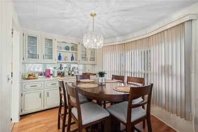Indulge in breathtaking panoramic golf course views and on Maple Leaf Golf and Country Club in Florida - for sale on GolfHomes.com, golf home, golf lot