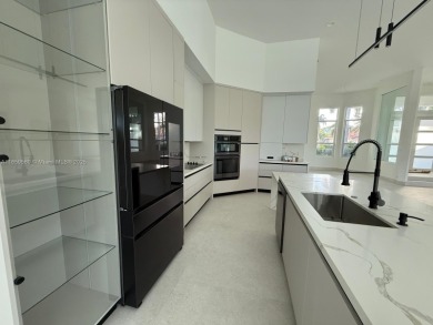 Live the ultimate Weston Hills lifestyle in this impeccably on Weston Hills Country Club in Florida - for sale on GolfHomes.com, golf home, golf lot