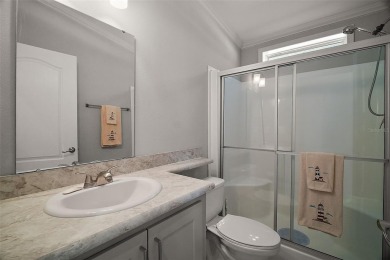 Come see this WATERFRONT 2 BED / 2 BATH / BONUS ROOM on Bay Tree Golf Course in Florida - for sale on GolfHomes.com, golf home, golf lot