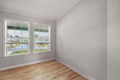 Come see this WATERFRONT 2 BED / 2 BATH / BONUS ROOM on Bay Tree Golf Course in Florida - for sale on GolfHomes.com, golf home, golf lot