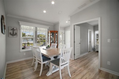 Come see this WATERFRONT 2 BED / 2 BATH / BONUS ROOM on Bay Tree Golf Course in Florida - for sale on GolfHomes.com, golf home, golf lot