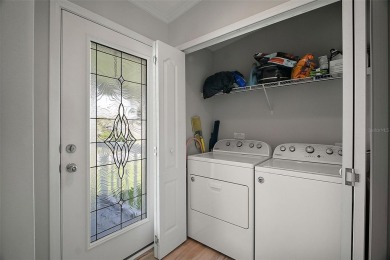 Come see this WATERFRONT 2 BED / 2 BATH / BONUS ROOM on Bay Tree Golf Course in Florida - for sale on GolfHomes.com, golf home, golf lot