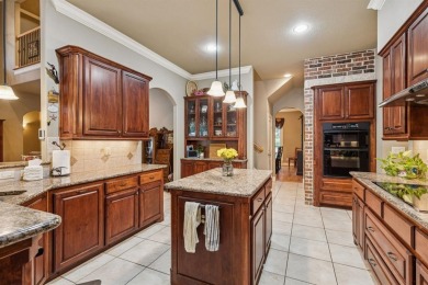 This beautifully maintained, one-owner home sits on just under on The Golf Club at Resort Eagle Mountain Lake in Texas - for sale on GolfHomes.com, golf home, golf lot