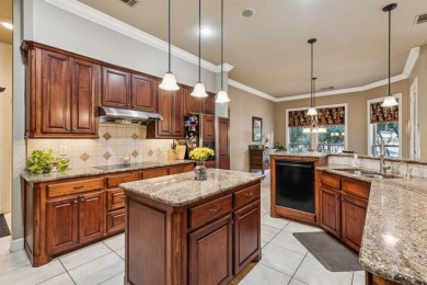 This beautifully maintained, one-owner home sits on just under on The Golf Club at Resort Eagle Mountain Lake in Texas - for sale on GolfHomes.com, golf home, golf lot