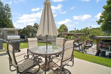 Come see this WATERFRONT 2 BED / 2 BATH / BONUS ROOM on Bay Tree Golf Course in Florida - for sale on GolfHomes.com, golf home, golf lot