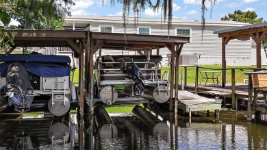 Come see this WATERFRONT 2 BED / 2 BATH / BONUS ROOM on Bay Tree Golf Course in Florida - for sale on GolfHomes.com, golf home, golf lot