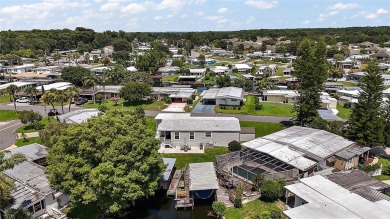 Come see this WATERFRONT 2 BED / 2 BATH / BONUS ROOM on Bay Tree Golf Course in Florida - for sale on GolfHomes.com, golf home, golf lot
