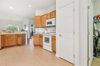 Live your best life in this bright and spacious beauty inside on Poinciana Golf Club in Florida - for sale on GolfHomes.com, golf home, golf lot