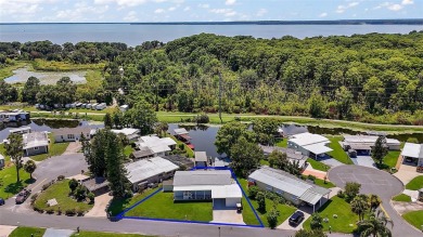 Come see this WATERFRONT 2 BED / 2 BATH / BONUS ROOM on Bay Tree Golf Course in Florida - for sale on GolfHomes.com, golf home, golf lot