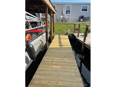 THIS HOME IS GREATLY REDUCED AND PRICED TO SELL!!  Come see this on Bay Tree Golf Course in Florida - for sale on GolfHomes.com, golf home, golf lot