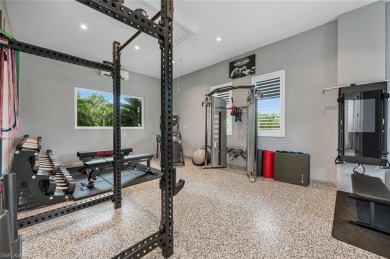 The ultimate waterfront lifestyle awaits in this exclusive on Miromar Lakes Golf Club in Florida - for sale on GolfHomes.com, golf home, golf lot